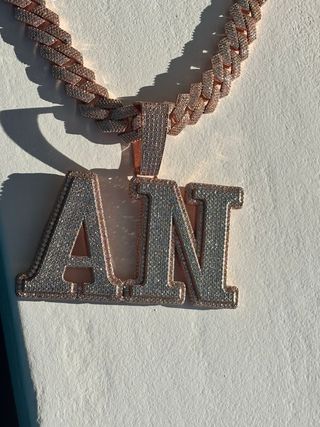 Cadena y Colgante AN color oro rosado