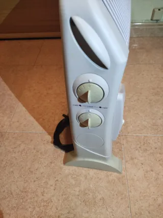 Convector DeLonghi con ventilador de aire caliente