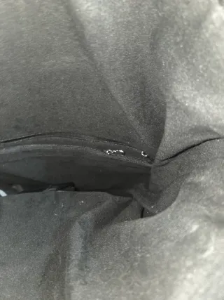 Mochila negra con hebilla