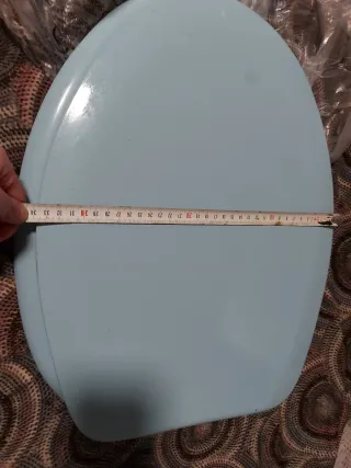 Tapa de inodoro, sanitario azul