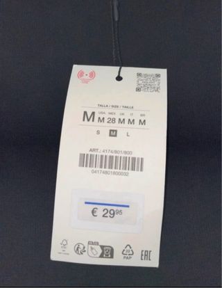 Mini abito nero con balze