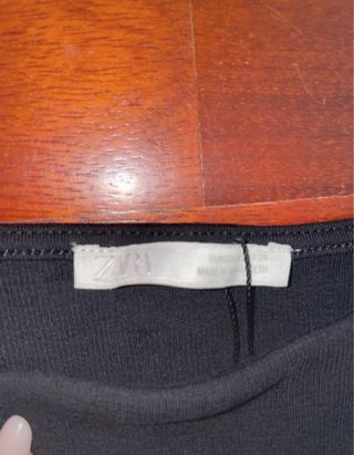 Mini abito nero con balze