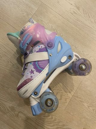 Patines niña 4 ruedas morados y blancos