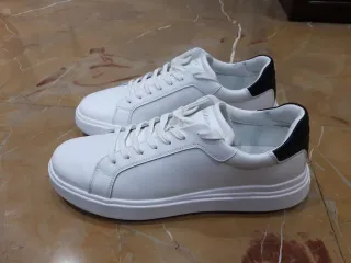 Zapatillas Calvin Klein Piel Blancas y Negras