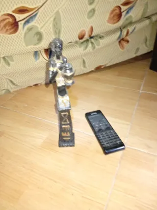 Decorazione per ingresso in metallo nero e dorato