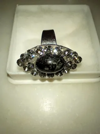 Lote 4 anillos plateados con piedras