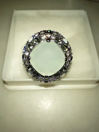 Lote 4 anillos plateados con piedras