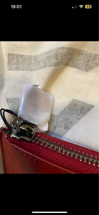 Cartera Adolfo Domínguez Piel Burdeos  y Roja