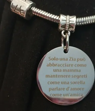 Pulsera con dijes Zia y corazón