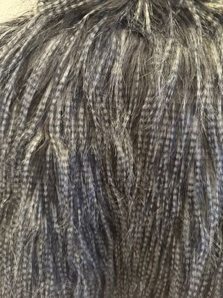 Chaleco crop pelo gris y negro