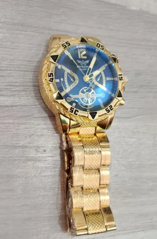 Reloj Dorado con Esfera Azul