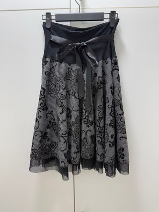 Gonna elegante con fiocco in vita