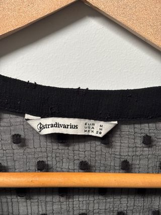 Blusa negra transparente Stradivarius mujer