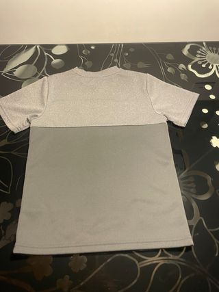 Camiseta McKenzie Niño Gris y Blanca
