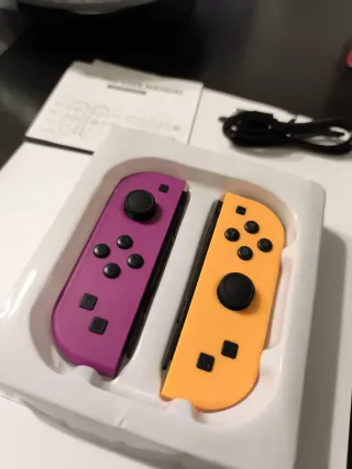 Mando Nintendo Switch Morado y Naranja