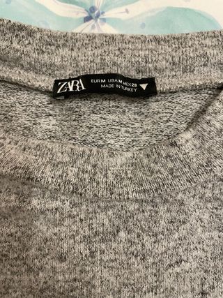 Jersey gris con perlas