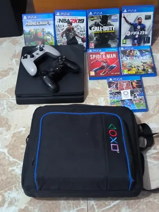 PS4 + 7 juegos+ mandos + bolso