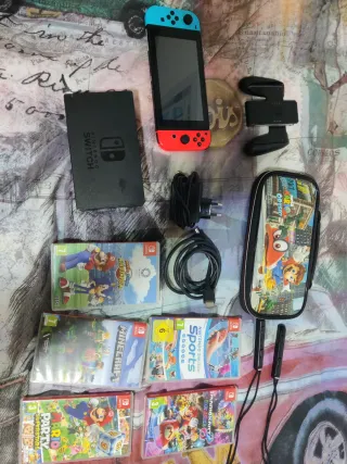 Nintendo Switch con funda y 5 juegos
