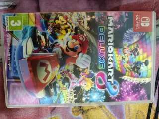 Nintendo Switch con funda y 5 juegos