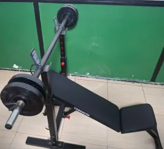 Banco de pesas Corength con barra y discos