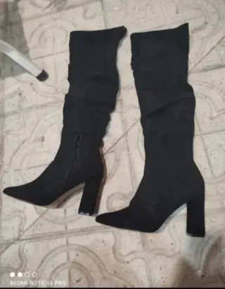 Botas altas negras de tacón