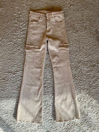 Pantalones campana Mango beige T32