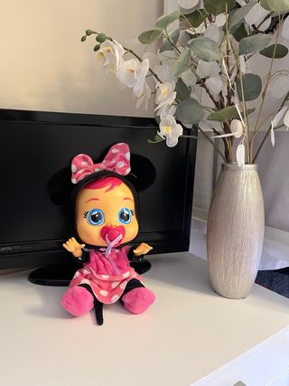 Bebé Llorón con mochila rosa