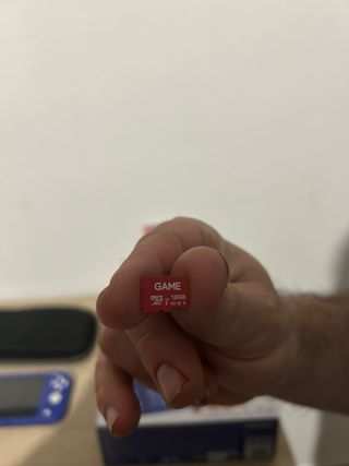 Nintendo Switch Lite Blu + Luigi's Mansion 3