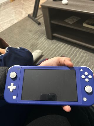 Nintendo Switch Lite Blu + Luigi's Mansion 3
