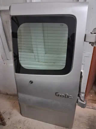 Puerta Renault tranfi 2004