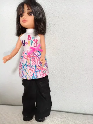 Muñeca Nancy con vestido, pantalón y botas