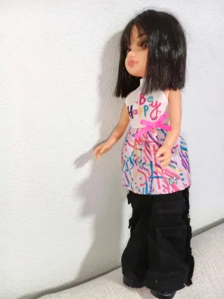 Muñeca Nancy con vestido, pantalón y botas