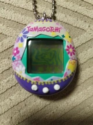Tamagotchi Morado de Bandai