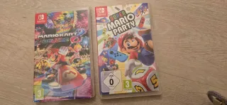 Nintendo Switch con funda y cuatro mandos