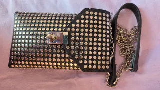 Bolso móvil tachuelas cadena ñ