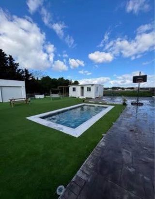 parcela segregada con piscina y mobilhome