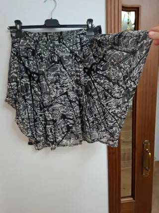 Falda plisada con cremallera