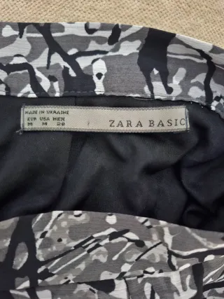 Falda plisada con cremallera