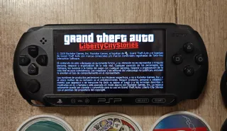 Sony PSP E1004 Nera + 9 UMD