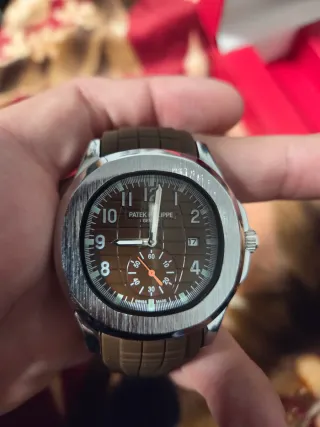 Reloj Patek Philippe Marrón y Plateado