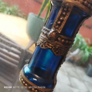 Botellas antiguas metal y cristal