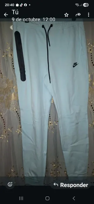 Conjunto deportivo Nike azul y blanco