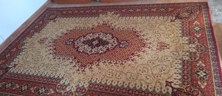 Alfombra de salón de lana beige y roja