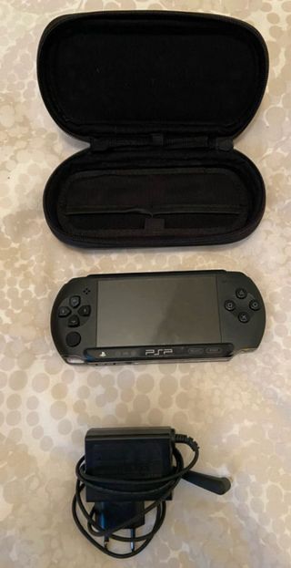 Console PSP nera + 3 giochi in perfette condizioni