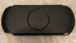 Console PSP nera + 3 giochi in perfette condizioni