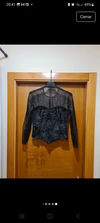 Blusa de fiesta negra con estampado brillante