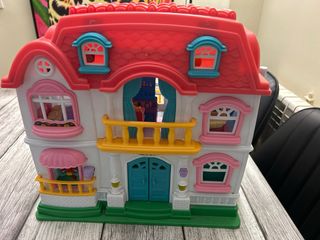 Casa de muñecas plegable con accesorios