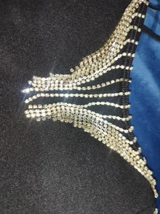 Top con detalles plateados