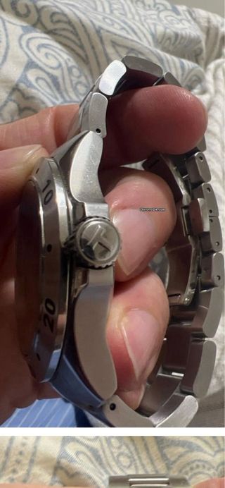 Reloj Tissot Swissmatic Negro y Plateado