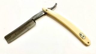 Navaja de barbero Palmera